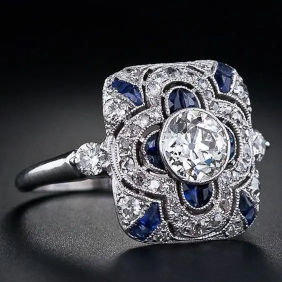 Antique silver band featuring blue zirconia