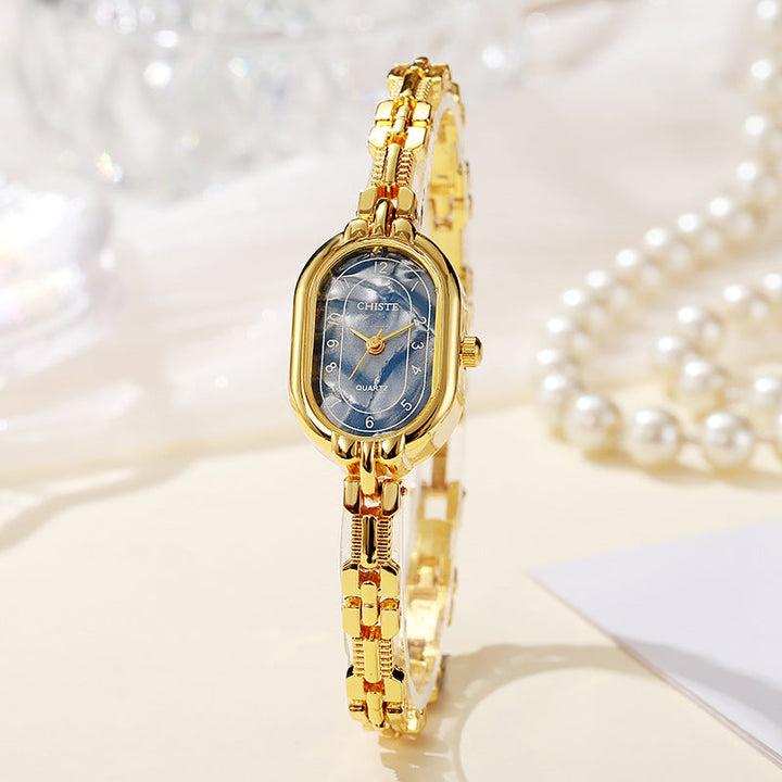 Celeste Timepiece | Gold