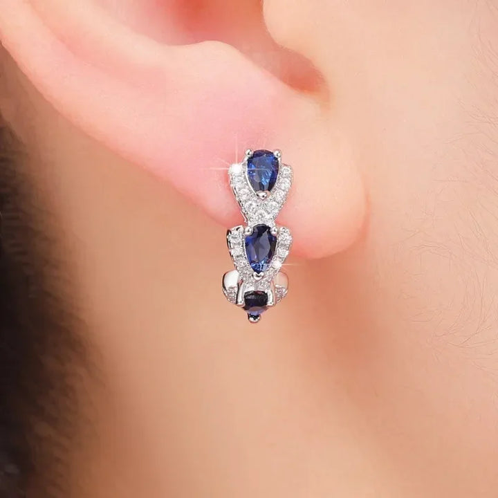 Majestic Emerald Shield Earrings | Platinum