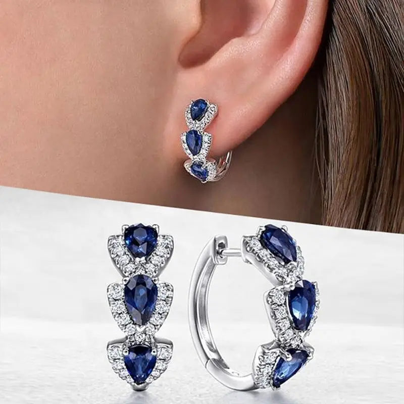 Majestic Emerald Shield Earrings | Platinum